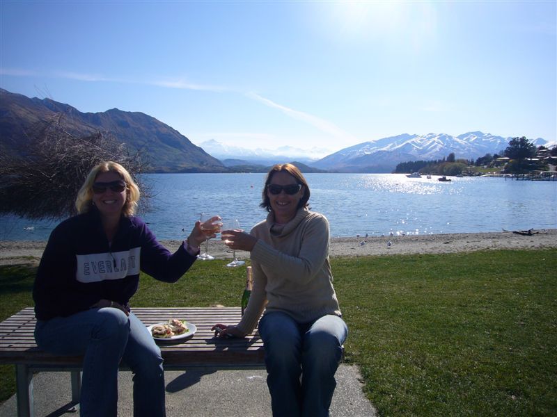 Enjoying a glass of New Zealand by the lake in Wanaka